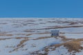 Small hut on snow hill, Iceland Royalty Free Stock Photo