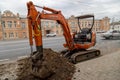 small hydraulic excavator Hitachi Zaxis ZX-22 on street of Tula, Russia
