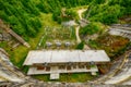 Small hydro electric dam harnessing water power Royalty Free Stock Photo