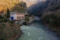 Small hydroelectric power station in mountains, Mahunceti, Georgia, aerial view