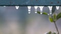 Small icicles on a nickel-plated handrail, the first autumn frosts Royalty Free Stock Photo