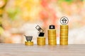 Small icon with coins stacked with bokeh Royalty Free Stock Photo