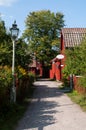 Small idyllic road leading to swedish shop in old town Linkoping
