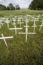 A small Impromptu memorial of white crosses to Grieve the Loss of Hundreds of Indigenous Children