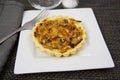 Individual quiche with onions