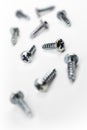 Small Iron Screws In A White Box - Crooked Angle Royalty Free Stock Photo