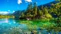 Small island in the middle of the crystal clear waters of Pavilion Lake in Marble Canyon Provincial Park, British Columbia Royalty Free Stock Photo