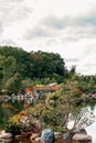 Frederik Meijer Gardens - Grand Rapids, MI, USA - September 8th 2019:  Small island in the middle of a lake of the japanese garden Royalty Free Stock Photo