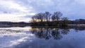 Small island in the middle of lake in rural Michigan