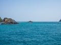 A small island in the middle of the sea and the hot sun. Royalty Free Stock Photo