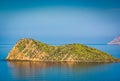 Small island near Cala Iris in North Morocco by Mediterranean Sea