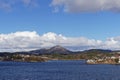 Small Islands within the Bergen Fjord with Traditional Norwegian Houses situated on them. Royalty Free Stock Photo