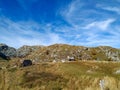 Small village in the mountains for idyllic living in the nature with a view of mountain ranges and rooftops of houses