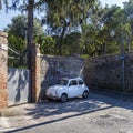 Small italian car outside villa