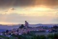 Small italian town on the hills at sunset. Royalty Free Stock Photo