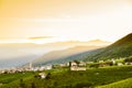 Small italian town of valdobbiadene on hills at sunset Royalty Free Stock Photo