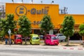 small Japanese trucks converted into taxis for tourists called tuk tuk in Thailand on the island of Phuket. Multi-colored cars on