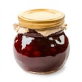 A small jar of strawberry jam with visible fruit chunks, isolated on a Royalty Free Stock Photo