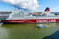 Small JT-Line ferry floating by huge cruiseferry Mariella of Viking line