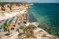 A small Kalymnos beach with a few deck chairs and umbrellas, Cyprus