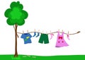 Small kid clothes drying on a rope