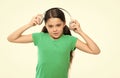 Small kid listen music headphones. No ad interruptions. Play any song. Try premium account. Enjoy nonstop music