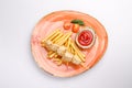 Small kid`s meal. A plate of chicken nuggets with french fries with ketchup on a white background. Top view children`s menu food Royalty Free Stock Photo