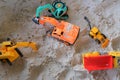 Small kid toy vehicle construction in sand playground Royalty Free Stock Photo