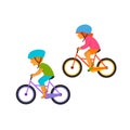 Small kids boy and girl riding bikes