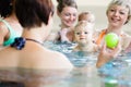 Babies and their moms at mother-and-child-swimming class Royalty Free Stock Photo