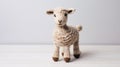 Handcrafted Knitted Sheep Toy With Soft Edges And Mismatched Patterns