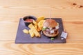 Small kobe beef burger with sliced Manchego cheese, caramelized onion Royalty Free Stock Photo