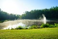 Small lake and morning fog Royalty Free Stock Photo