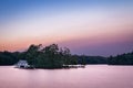 A small lakeside cottage on an Island in the Muskokas, Ontario, at sunrise.