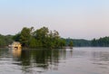 A small lakeside cottage on an Island in the Muskokas, Ontario, at sunrise.