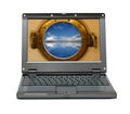Small laptop with nautical porthole Royalty Free Stock Photo