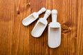 Small and large wooden spice scoops Royalty Free Stock Photo