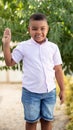 Small latin child counting with his fingers