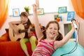 Small laughing girl with microphone