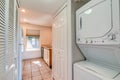 Small laundry room in tiny apartment