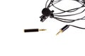 Small lavalier microphone or lapel mic with clip and adapter for computer Royalty Free Stock Photo