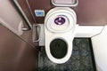 Lavatory toilet washroom in commercial flight aircraft Royalty Free Stock Photo