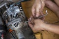 A small lawnmower Was disassembled for repair By a Thai mechanic The mower was adapted from a motorbike Royalty Free Stock Photo
