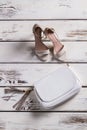 Small leather purse and footwear. Royalty Free Stock Photo