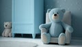 Small light blue armchair for kid standing in white room interior with stars on the wall, white rug and cupboard with books, teddy