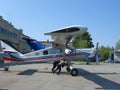 Small light-engine private jet workers roll on the runway Royalty Free Stock Photo