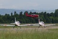 Small and Light Red Piper Aircraft Taking off from the Runway Royalty Free Stock Photo