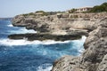 Small Lighthouse on Mallorca torre porto petro, water activities Royalty Free Stock Photo