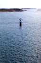 Small lighthouse in the ocean in Sweden