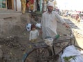 Small little girl with his father in Pakistan village loge